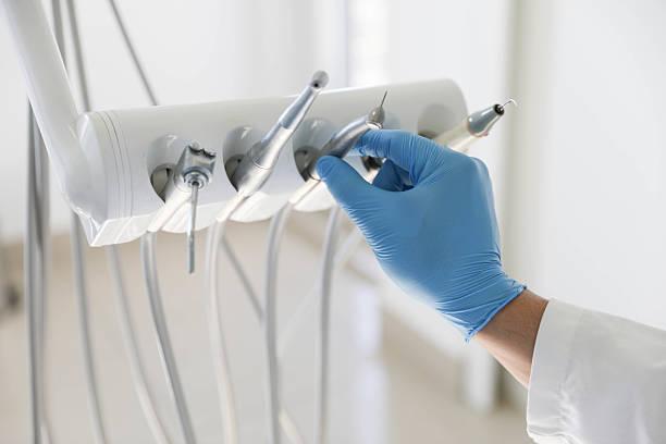 Professional Dental Implants technician working in Surrey, ND